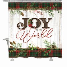 a christmas themed shower curtain with the words joy to the world written in red and green