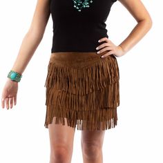 Brown short fringe leather skirt by Scully. This playful suede fringe skirt features three tiered fringe panels. It has a wide single point waistband. Rear zip closure that gives it that fitted shape.. Dry clean only. Perfect western style suede skirt for any cowgirl. Perfect for the rodeo, trip to Nashville or a country music concert festival. Color: Cinnnamon Brown Fringe Mini Skirt, Chic Brown Fringe Skirt, Fringe Leather Skirt, Suede Fringe Skirt, Country Music Concerts, Short Fringe, Brown Shorts, Brown Skirts, Fringe Skirt