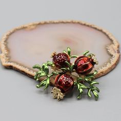 This Is A Brand New Pomegranate Shaped Pin And Its Approximate Measurements Are: 1-3/4" X 2". The Finished Weight Of The Pin Is 16 Grams. Br0301 Holiday Red Brooch Jewelry, Red Holiday Brooch, Pomegranate Brooch, Pomegranate Jewelry, Pomegranate Fruit, Brooch Jewelry, Green Gold, Pin Brooch, Fresh Fruit