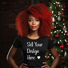 a woman with red hair wearing a t - shirt that says sell your design here