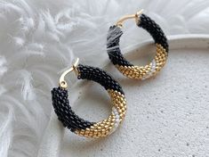 💖 These handmade black and gold seed bead beaded hoop earrings are the perfect accessory for any occasion. Whether you're looking for a unique gift for your sister-in-law's birthday or any jewelry lover in your life, these statement earrings are sure to impress. Surprise her with these eye-catching earrings that are sure to make a stylish statement wherever she goes. Plus, they are ready to ship, so you can enjoy them in no time! Add a touch of glam to any outfit with these unique chunky hoop e Sister In Law Birthday Gift, Seed Bead Hoop Earrings, Sister In Law Birthday, Bead Hoop Earrings, Gifts For Your Sister, Black Seed, Beaded Hoop Earrings, Beaded Hoops, Sister In Law