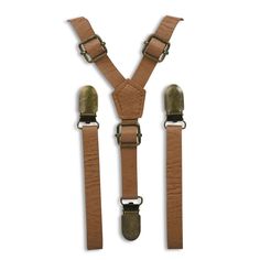 These 1/2” or 1" width faux leather adjustable suspenders in vintage tan, coffee brown, caramel, cognac, weathered coffee, dark walnut brown and black are perfect for your groomsmen, ring bearers, family photos or just because! DISCOUNT CODE You can receive 10% OFF when you: Pin this listing to your Pinterest Like the London Jae Apparel Facebook Page & Follow us on Instagram! Message me a screenshot of all 3 to receive your code. FACEBOOK http://www.facebook.com/londonjaeapparel INSTAGRAM @l Vintage Suspenders, Groomsmen Suspenders, Wedding Groomsmen Attire, Brown Suspenders, Bearer Outfit, Bowtie And Suspenders, Ring Bearers, Leather Suspenders, Wedding Groomsmen