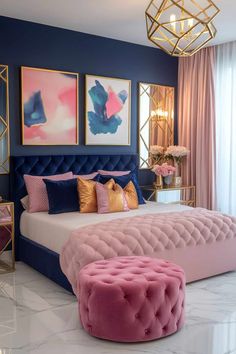 a pink and blue bedroom with gold accents