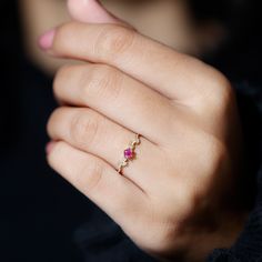 Product Details Show your love and affection with a gold beaded leaf ring, featuring a round-cut ruby. This ruby promise ring is the perfect way to express your feelings and is a beautiful and meaningful gift for a special woman in your life. Product Information SKU SHP-RINGS0821185381 Width 2.9 mm Height 3.7 mm Weight 1.10 gm (Approximate) RUBY INFORMATION No.of Stones 1 Pieces Total Weight 0.13 Carat (Approximate) Dimension(approx) Round-3X3 mm-1 Pcs Color Red Cut Brilliant Shape Round Setting Type Prong-Setting Quality Grade AAA DIAMOND INFORMATION No.of Stones 6 Pieces Total Weight 0.02 Carat (Approximate) Dimension(approx) Round-0.90X0.90 mm-6 Pcs Color HI Cut Brilliant Shape Round Setting Type Prong-Setting Quality Grade SI View More Product Parent Collection Handle ruby-rings 14k Gold Dainty Birthstone Ring For Proposal, Dainty 14k Gold Birthstone Ring For Proposal, Dainty Yellow Gold Birthstone Ring For Proposal, Ruby Heart Ring With Birthstone, Ruby Birthstone Ring For Promise, Promise Lab-created Ruby Birthstone Ring, Elegant Ruby Promise Ring For Valentine's Day, Ruby Birthstone Heart Ring, Dainty Diamond Birthstone Ring For Proposal