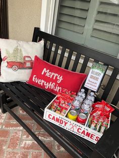 a bench that has some food on it and a pillow sitting on top of it