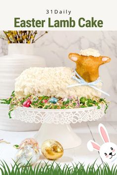 an easter lamb cake with white frosting and green grass on the table next to it