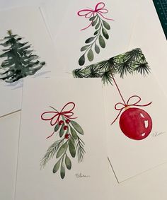 four cards with christmas decorations on them