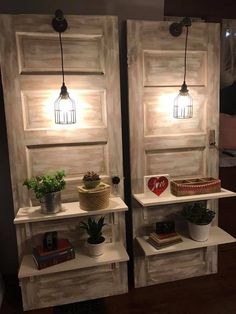 two white shelves with plants and books on them