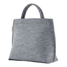 This is a minimalist gray felt handbag with zipper closure . It is made out of strong, technical felt, 4mm thick. Medium size work bag with short handles and a long strap - can be used as a crossbody purse. The bag looks really nice. Measurements: height 27 cm/ 10.5 inch depth max 15 cm/ 6 inch maximum width 31 cm/ 12 inch The bag has a zip closure. It was made taking care of each small detail. The bag stands on it's own. - 1 zippered pocket inside, - 1 mobile pocket, - 2 short handles and a rem Modern Large Capacity Gray Bag, Modern Gray Shoulder Bag With Top Carry Handle, Modern Gray Bag With Double Handle, Everyday Felt Tote Bag, Rectangular Felt Bags For Daily Use, Modern Gray Office Bag, Felt Handbag, Felted Handbags, Gray Handbags