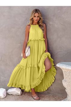 Indulge in comfort and style with our women's Ruffled Sleeveless Tiered Maxi Dress with Pockets. Perfect for casual wear, this dress is designed with a tiered skirt and ruffled sleeves for a playful touch. Enjoy the convenience of pockets while rocking this timeless maxi dress. Features: Tied, Tiered, High-Low, Ruffled, Smocked Sheer: Opaque Stretch: No stretch Body: Not lined Material composition: 100% polyester Care instructions: Machine wash cold. Tumble dry low. Imported Size US Length Bust Maxi Dress Designs, Maxi Dress With Pockets, Casual Chique, Elegant Maxi Dress, Dress Cake, Estilo Chic, Maxi Styles, Crewneck Dress, Tiered Maxi Dress