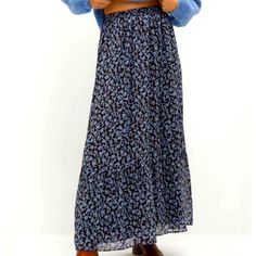 This Skirt Is Nwt. It’s A Light Blue Floral On Brown Background. The Chiffon Is Soft And It Is Fully Lined. It Fits Tts. You Can Wear This Skirt Year Round. Wear This With A White T-Shirt And Denim Jacket Throw On Some Espadrilles And Your Set For Spring/Summer. For A Fall/Winter Look Pair This With A Soft Cream Sweater And Brown Riding Boots. Blue Skirted Bottoms For Fall, Blue Pleated Maxi Skirt For Fall, Blue Relaxed Maxi Skirt For Fall, Blue Lined Maxi Skirt For Fall, Blue Bottoms For Fall Vacation, Blue Bottoms For Vacation In Fall, Mango Skirts, Brown Riding Boots, Floral Maxi Skirt