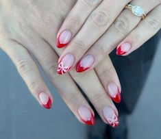 Cute Christmas Holiday or Valentines Day Nail Design with Bow and Red French Tip Valentines Day Nails With Bows, White French With Red Design, Cute Christmas Nails Simple French Tips, Valentines Bow Nails, White French Tips With Red Design, Bow Valentines Nails, Christmas Nail Ideas Holiday French Tips, Cute French Tip Christmas Nails, Red French With Bow