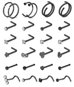 an assortment of black metal hooks and screws