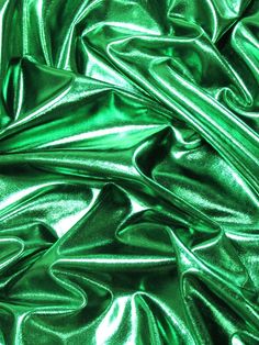 the green fabric is very shiny