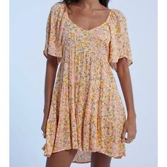 Made Of Airy Crinkle Fabric, This Floaty Floral Babydoll Dress Has All The Pretty Details: Flutter Sleeves, A V-Neck, And A Tiered Ruffle Skirt. Crinkle Viscose Fabric. Floaty Fit. V-Neck. Flutter Sleeves. Tiered Ruffles At Skirt. 100% Viscose. New With Tags! I Try To Ship Same Day Billowy Short Sleeve Mini Dress For Summer, Ditsy Floral Print Tiered Dress For The Beach, Flowy Rayon Mini Dress With Short Sleeves, Flowy Short Sleeve Rayon Mini Dress, Casual Billowy Floral Print Dress, Flowy Rayon Mini Dress With Ruffles, Billowy Floral Print Dress With Short Sleeves, Billowy Mini Dress With Short Sleeves, Billowy Short Sleeve Floral Print Dress