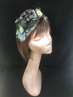 1940s floral print turban style head band. A real statement piece with a standard width inner Alice band attached within the lining to provide an easy to wear design. Completed with quills of fabric, buttons and lined with a fine fleece. The perfect accessory for style and added warmth. This unique creation is a stunning example of a vintage inspired accessory with an eye catching easy to wear and lightweight design. Fabric Buttons, Alice Band, Turban Style, Vintage Band, Head Band, Head Scarf, Fascinator, Hippie Boho, Vintage Inspired