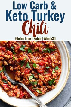 low carb and keto turkey chili in a white bowl with a serving spoon