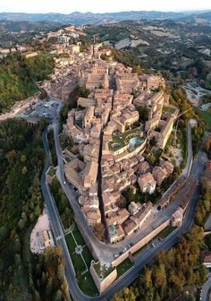 an aerial view of a city with lots of buildings