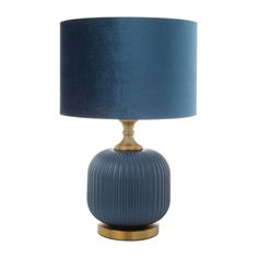 a blue lamp with a gold base on a white background, it has a dark blue shade