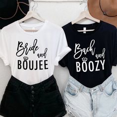 two t - shirts that say bride and bouye are hanging on a wall