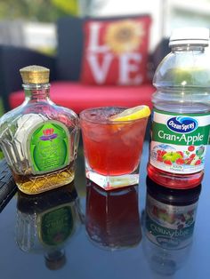 three different types of drinks on a table