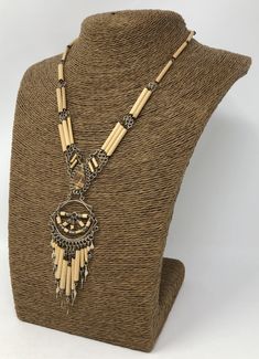 "Peruvian Style Natural Bamboo Necklace and Earrings Set with Brown Color Stone Handmade Boho Design 2 Piece Jewelry Set - Includes Necklace and Earrings Dimensions: Necklace - 18\" Inches around the neck Pendant: 4\" Inches long Earrings - 3\" Inches long Fast Shipping! This unique natural bamboo and stone jewelry set is simply stunning. Handcrafted: Skillfully created by artisan. Visit my Etsy Shop to see more Handmade Jewelry! At Freedom Life Style Jewelry you will find a variety of Necklaces Elegant Beige Metal Jewelry, Gold Decorative Dangle Jewelry, Festival Jewelry Sets With Dangle Earrings, Bohemian Beige Dangle Jewelry, Beige Bohemian Jewelry, Traditional Handmade Beige Jewelry, Decorative Pendant Costume Jewelry, Nickel-free Beige Bohemian Jewelry, Bohemian Nickel-free Beige Jewelry