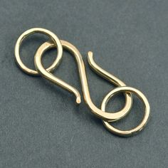 "Handmade 14k Gold Filled or Fine Silver S Clasp and Closed Loop Connectors Metal type : 14k Gold Filled or Fine Silver Wire Gauge: S Clasp 14g = 1.63mm & Closed Rings 16g = 1.29mm Style : S Clasp Length: approx. 0.45\" wide x 1\" long & Rings 8mm (inner diameter) Fabrication: Handcrafted by me, so there may be slight variations in size and shape. Please keep in mind that all components are made to order and will ship in 3-5 business days" Untreated Heirloom 14k Gold Jewelry, Heirloom Yellow Gold Untreated Jewelry, Heirloom Untreated Yellow Gold Jewelry, Nickel Free Yellow Gold Jewelry For Collectors, Gold Untreated Jewelry As A Gift, Long Rings, Wire Clasp, Necklace Clasp, Wire Gauge