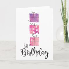 a card with the words happy birthday written in black ink and watercolor on it