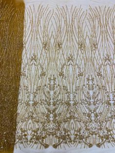 two different types of fabric with gold thread on them