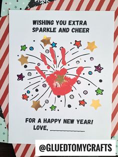 a handprinted card for someone's new year with fireworks and stars on it