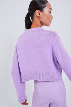 The Lilac Aiden Sweater is a perfect style for year-round wear. Flattering details include the slightly cropped length, ribbed borders, and relaxed fit. The sweet light purple is our favorite part- pair with denim and booties in the winter, and a mini skirt and sandals in the summer! Ribbed crewneck Dropped shoulders Long sleeves with ribbed cuffs Relaxed body Ribbed hem Slightly cropped length Material: 100% Cotton Care: Machine wash cold, tumble dry low, low iron Spring Cropped Sweater With Ribbed Collar, Spring Cropped Sweater With Relaxed Fit, Spring Cropped Sweater With Ribbed Collar And Relaxed Fit, Spring Ribbed Cropped Sweater In Relaxed Fit, Spring Ribbed Cropped Sweater Relaxed Fit, Spring Ribbed Cropped Sweater With Relaxed Fit, Spring Ribbed Relaxed Fit Cropped Sweater, Spring Solid Cropped Sweater With Relaxed Fit, Trendy Cropped Sweater With Ribbed Collar For Spring