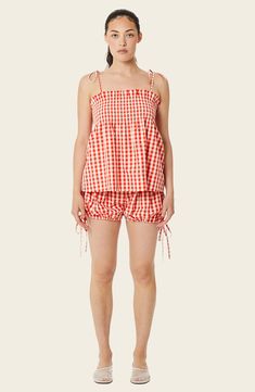 Go for retro style in these bloomer shorts that have dainty ties on each side and a ruffled waist to finish the look. 2" inseam (size Small) Elastic waist 70% polyester, 30% cotton Machine wash, tumble dry Imported Spring Gingham Shorts For Daywear, Gingham Shorts For Spring Daywear, Gingham Cotton Shorts For Daywear, Summer Cotton Pajama Shorts With Ruffles, Summer Plaid Bottoms With Ruffles, Casual Gingham Shorts With Ruffles, Spring Gingham Shorts For Picnic, Gingham Shorts For Picnic And Summer, Summer Gingham Shorts For Picnic