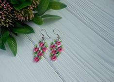 Flower beaded earrings for girls / Romantic earrings for women / Miyuki bead earrings  / Pink flower earrings / gift for mom This women beaded earrings. Perfect for summer jackets or blouses. It is also an original present for yourself or someone else. I'm sure it brings joy. Earrings made from high quality Japanese beads Miyuki delica. The length of the earrings is 3.2 cm or 1.26 inches. Width of 1.8 cm 0.71 inches. If you have any questions, email me. Colorful Beads Flower-shaped Earrings For Gift, Colorful Beaded Flower-shaped Earrings For Gifts, Colorful Beaded Flower-shaped Earrings As Gift, Colorful Beaded Drop Flower Earrings For Gift, Dangle Flower Earrings With Tiny Beads For Gift, Dangle Flower Earrings With Tiny Beads As Gift, Flower-shaped Colorful Beaded Earrings, Handmade Dainty Beaded Drop Earrings, Colorful Beads Flower Earrings As Gift