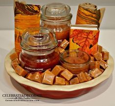 a bowl filled with lots of different types of food next to some cards and candles