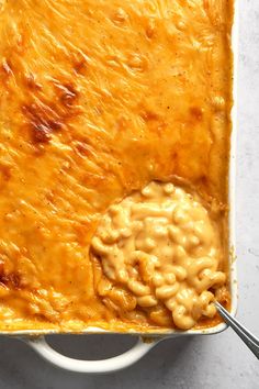 a casserole dish with macaroni and cheese in it, ready to be eaten