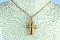 Wooden cross.Cross made of cherry or bog oak Comes attached to an adjustable cotton cord with ceramic bead. Cord Length is 55-65cm. Pendant size is 42mm Adjustable Cross Necklace With Wooden Beads, Adjustable Brown Cross Necklace, Necklace Wood, Wood Cross, Wood Crosses, Wooden Cross, Wood Necklace, Wooden Pendant, Ceramic Beads