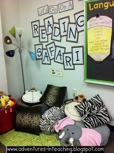 a room with stuffed animals and posters on the wall