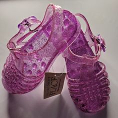 The Children's Place Purple Glitter Jelly Sandals. Color: Purple Size: 7 Condition:New With Tag. Super Cute For The Little Fashionista In Your Life. Dressed Them Up Or Dressed Down, With This Classic Style Shoe! Non-slip Closed Toe Sandals For Party, Party Jelly Sandals With Round Toe In Plastic, Non-slip Closed Toe Party Sandals, Party Jelly Sandals With Round Toe, Pink Plastic Jelly Sandals For Party, Pink Plastic Party Sandals, Closed Toe Plastic Sandals For Party, Flat Plastic Jelly Sandals For Party, Party Closed-toe Plastic Sandals