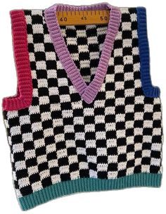 Trendy Knitted Winter Vest, Knitted Cotton Vest For Fall, Trendy Knitted Vest For Fall, Casual Multicolor V-neck Sweater Vest, Trendy Sleeveless Cotton Sweater, Casual Multicolor Sweater Vest For Winter, Casual Black Wool Sweater Vest, Black Sleeveless Wool Top, Cotton Sweater Vest For Winter