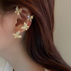 Presenting our Butterfly Ear Cuffs, an incomparable blend of artistry and sophistication to uplift any outfit!

Crafted with AAA-quality cubic zirconia, these earrings never miss reflecting light, flashing with every turn. High-polished, shining with brilliance, they stand to be more than earrings.
Benefits of the Butterfly Ear Cuffs :

 	AAA-Quality Cubic Zirconia : each stone is cut precisely to bring out high brilliance and vibrant sparkle. This will make you sparkle like a star, whether it's your formal event or just that casual time out.
 	Hypoallergenic & Nickel-Free : designed with comfort in mind, our Butterfly Ear Cuff will be perfect for sensitive ears. Say goodbye to irritation and discomfort since these earrings allow you to wear them the whole day with no problem.
 	Classic ye Perfect Gift For Girlfriend, Fake Piercing, Ear Earrings, Ear Cuff Earings, Earrings Accessories, Ear Cuffs, Butterfly Earrings, Cuff Earrings, Tassel Earrings