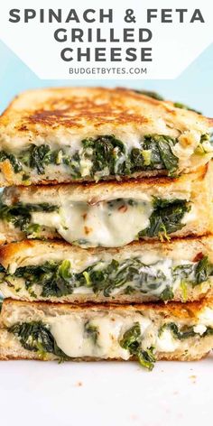 spinach and feta grilled cheese sandwich stacked up on top of each other