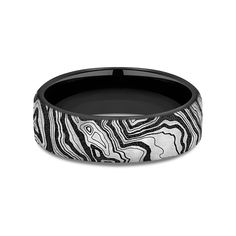 a black and white wedding band with an abstract design