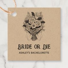 a card with the words bride or die written on it and a bouquet of flowers