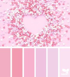 a pink and white heart surrounded by hearts