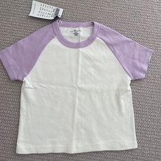 Brandy Melville Purple Sleeve Crop Top Tee Baseball Style Tee Never Worn Nwt 100% Cotton Preppy Shirts For School, Purple Everyday Spring Top, Basic White Summer Shirt, Purple Everyday Spring Tops, Purple Tops For Everyday Spring Wear, Light Purple Tops, Trendy Purple Everyday Top, White Short Sleeve Basic Tops, Everyday Purple Short Sleeve Tops