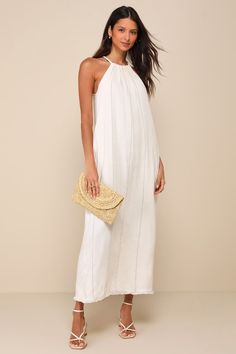 A sun-soaked vacay isn't complete without the Little Lies Ainsley Beige Pinstriped Linen Halter Maxi Dress with Pockets! Breezy, linen-blend woven fabric features a subtle pinstriped design as it shapes an adjustable, drawstring halter neckline with thick, tubular straps that tie above a keyhole cutout at the back. Relaxed bodice continues into a shift-style silhouette with side seam pockets and a maxi skirt with a fringe-adorned hem. Kick pleat at back. Fit: This garment fits true to size. Leng Linen Beach Dress For Spring Day Out, Spring Linen Beach Dress For Day Out, Spring Day Out Linen Beach Dress, Breezy Unlined Beach Dress For Spring, Spring Linen Maxi Dress For Day Out, Spring Breezy Unlined Beach Dress, Bohemian Linen Dress For Summer Day Out, Spring Day Out Linen Maxi Dress, Bohemian Linen Dress For Summer