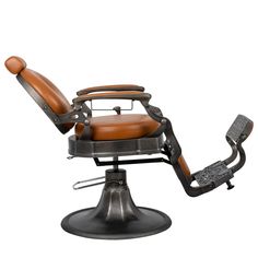 an old fashioned barber chair with leather seat