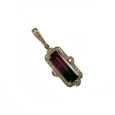 14K Yellow Gold 1 Rectangular Watermelon Tourmaline = 3.92ctw. 46 Round Diamonds = 0.35ctw. The pendant measures 34mm tall and 12mm wide. The chain is not included. Elegant Oblong Gemstone Jewelry, Luxury Tourmaline Pendant Jewelry, Rectangular Tourmaline Gemstone Jewelry, Fine Jewelry Tourmaline Pendant, Elegant Tourmaline Jewelry With Accent Stones, Elegant Tourmaline Pendant Jewelry, Rectangular Tourmaline Jewelry For Gifts, Rectangular Tourmaline Jewelry Gift, Tourmaline Gemstone Pendant Jewelry