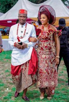 two people dressed in traditional african clothing