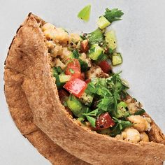 a pita filled with vegetables and meat